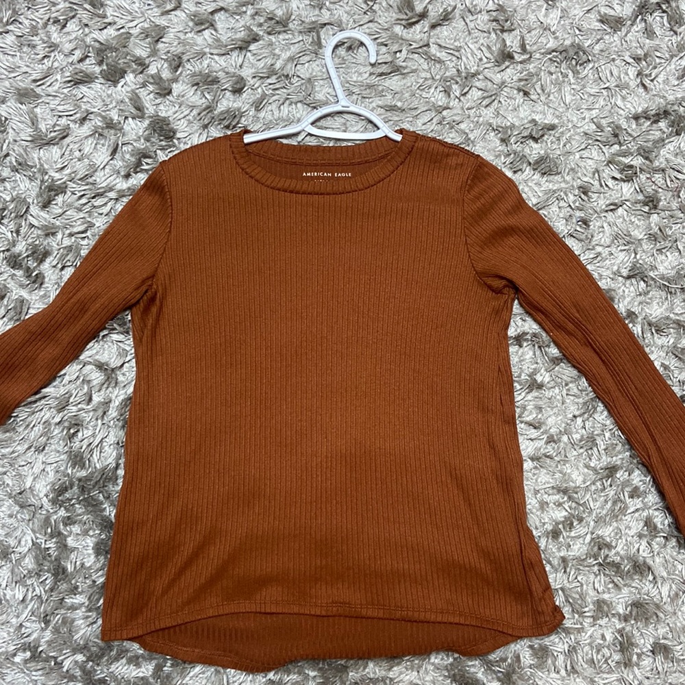 Cute long sleeve top. Size: XS very comfortable